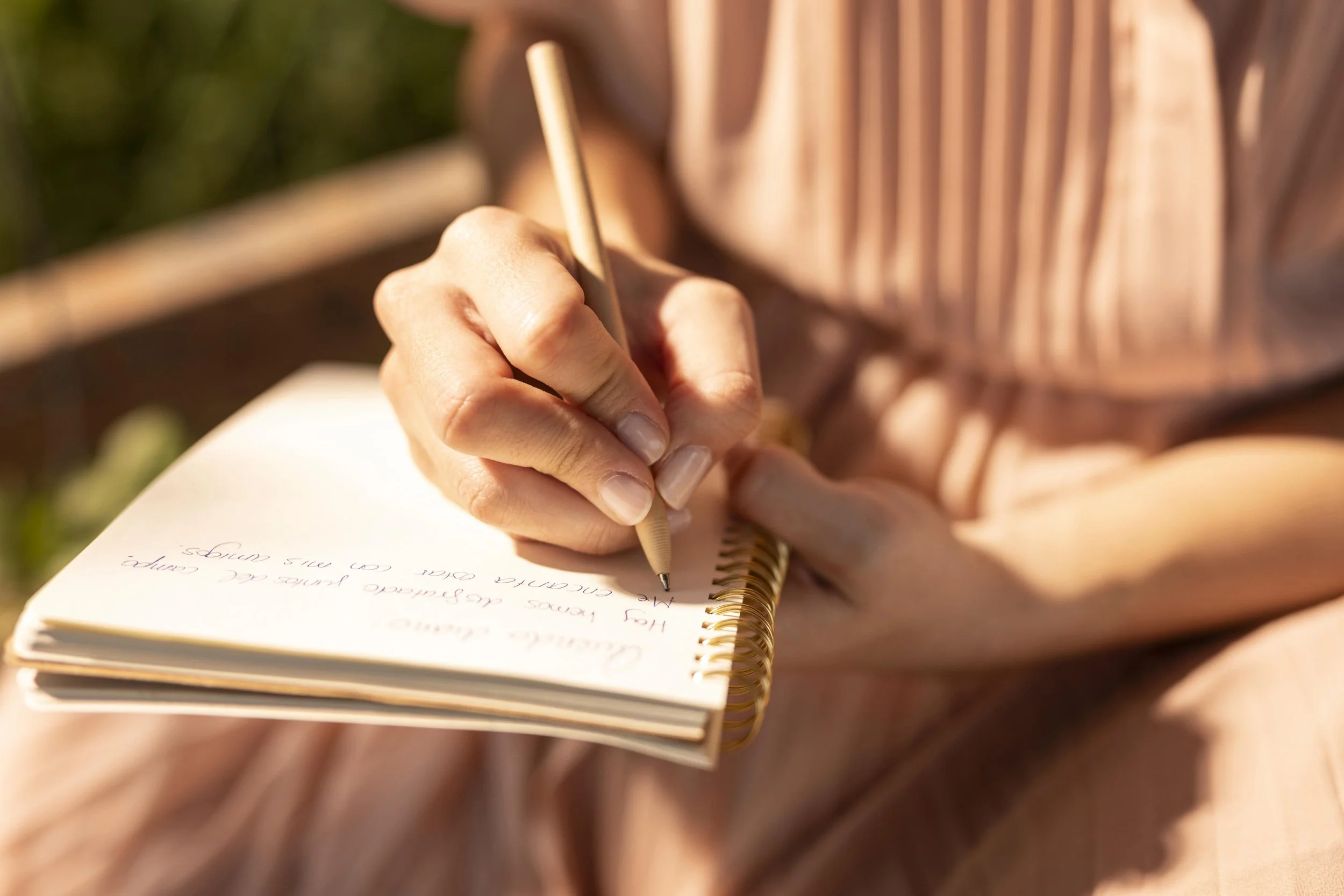 Illustrated open journal with soft glowing lines suggesting a personal daily writing and reflection routine